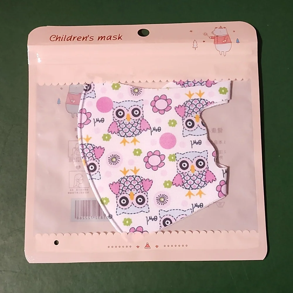 Children's re Usable face mask new in package never opened